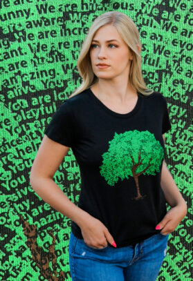 featured image of Think Possible Apparel's dancing tree design screen printed on a women's organic tee  in the color black