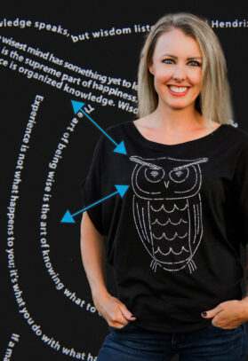 featured image of Think Possible Apparel's wise owl design screen printed on a organic flowy tee  in the color black